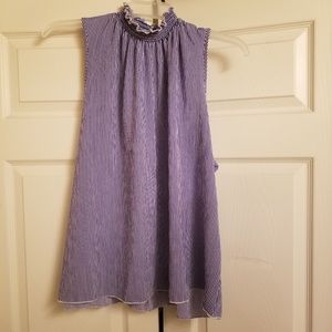 Sleeveless high neck top